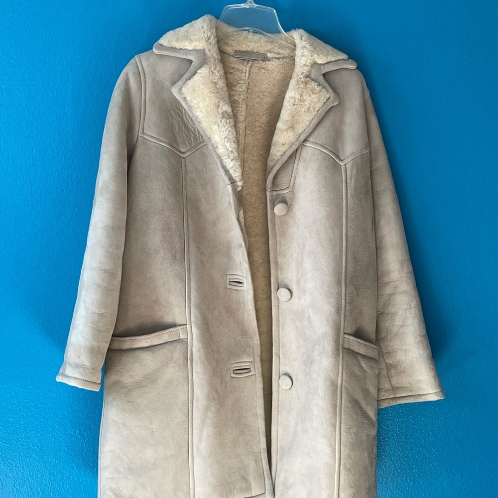 Beige Eddie Bauer Fall/Winter coat. Real suede with shearling lining.